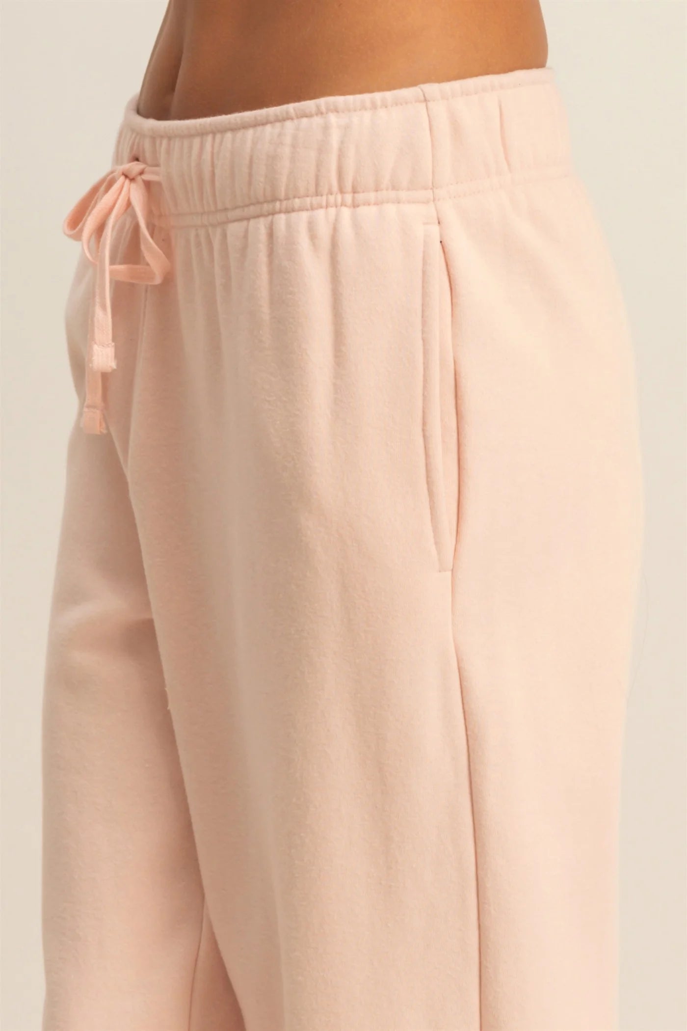MID-RISE DRAWSTRING JOGGERS IN DUSTY PINK
