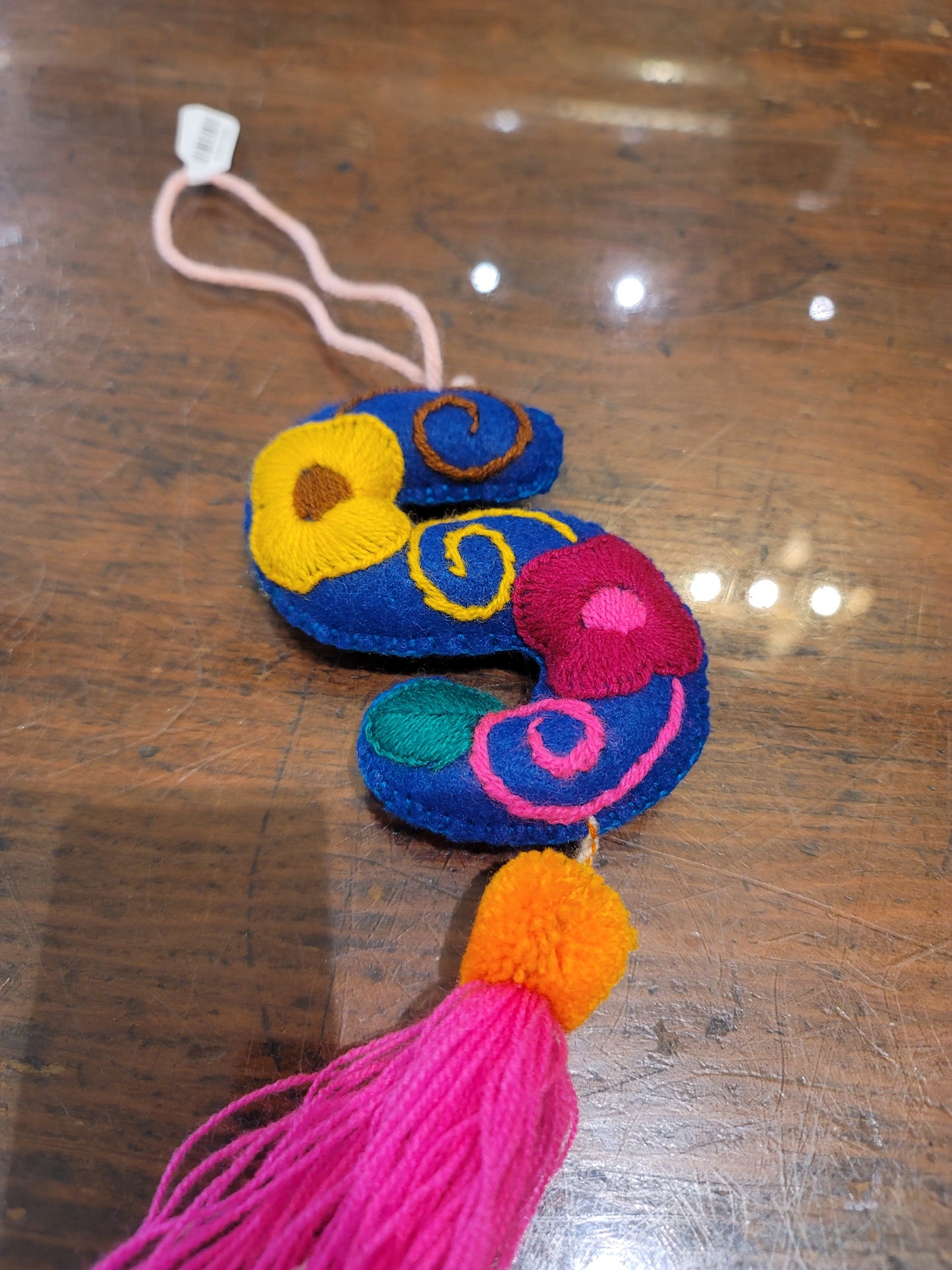 FELT INITIAL WITH TASSEL