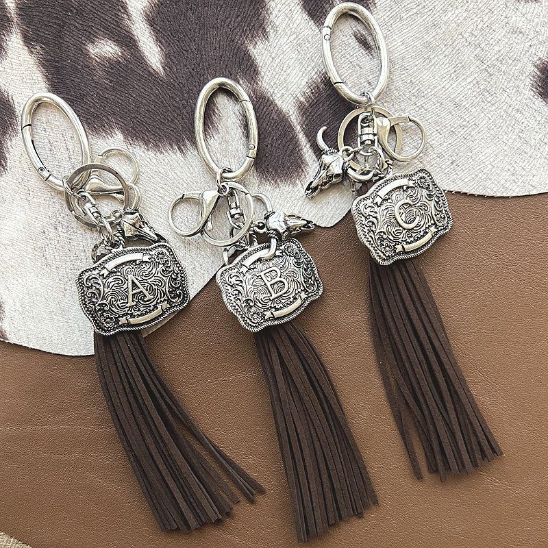 INITIAL BUCKLE TASSEL KEYCHAIN