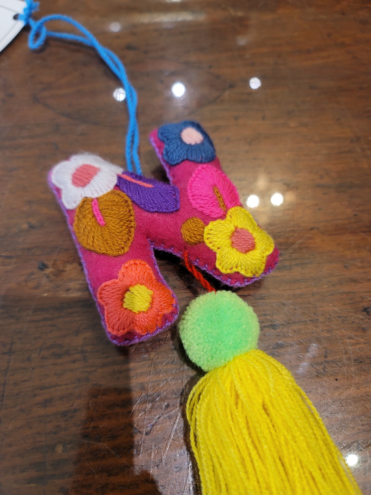 FELT INITIAL WITH TASSEL