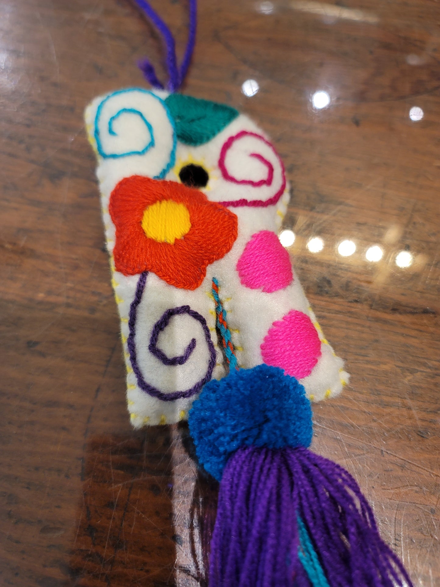 FELT INITIAL WITH TASSEL